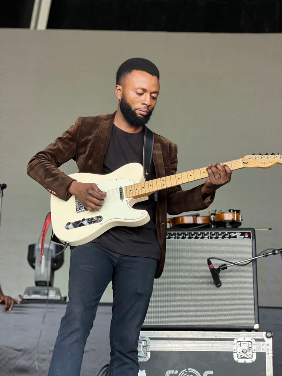Ogunlowo Daniel Segun performing on an outdoor festival stage